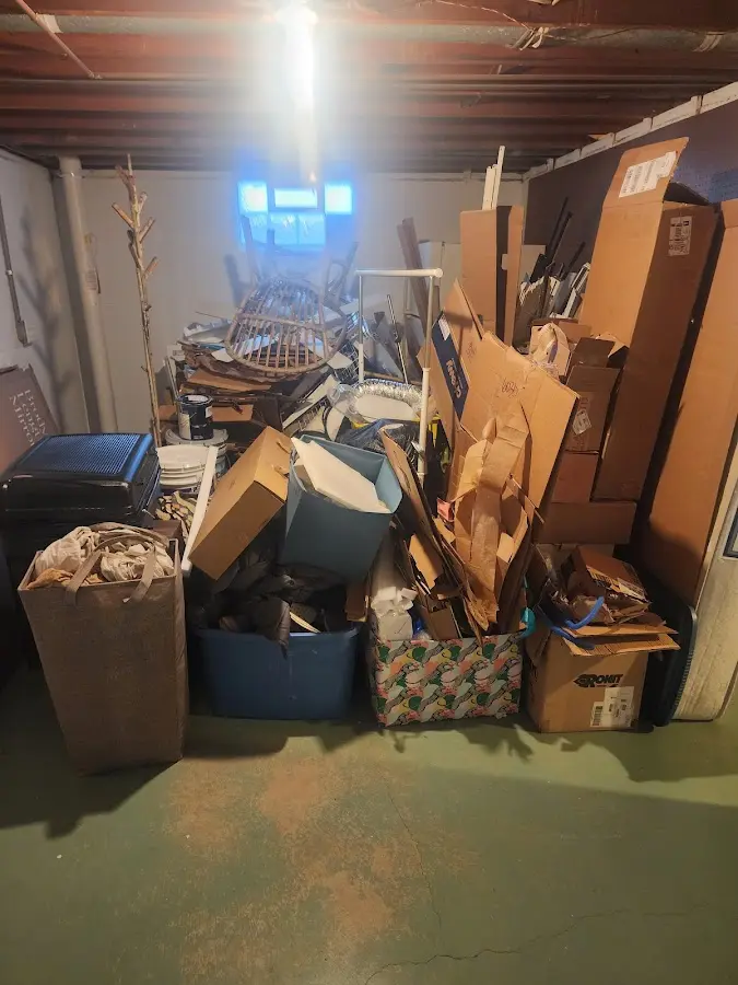 Roll-off dumpster container at job site for Yard Waste Dumpster Rental in Fenton